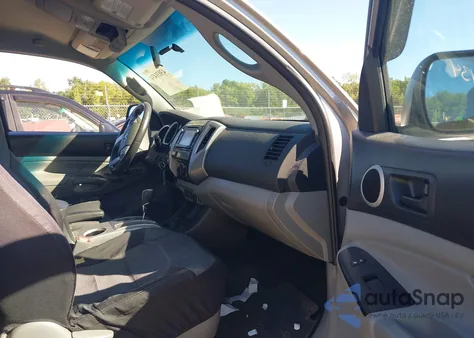 2014 Toyota Tacoma Base V6 z USA, uszkodzony, nr VIN 3TMMU4FN0EM067475